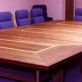 Conference Tables, free standing: natural walnut, maple and French walnut.